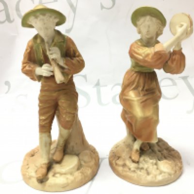 A pair of Royal Worcester James Hadley musician couple figures dated 1803, Approx 16.5cm tall .this lot cannot be posted