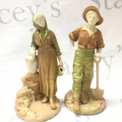 A pair of Royal Worcester James Hadley figures dated 1810, 18cm tall. This lot cannot be posted