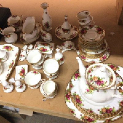 A Royal Albert Old Country Roses tea set including a teapot, saucers , cups etc