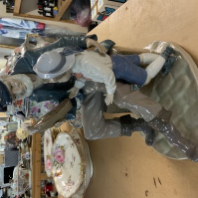 A Lladro Figurine of a Fisherman & Boy (A Tall Yarn).