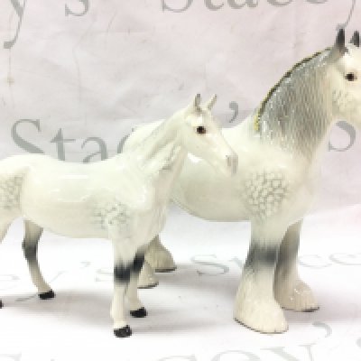 Two porcelain Beswick horse figures 17 and 21cm tall.this lot cannot be posted