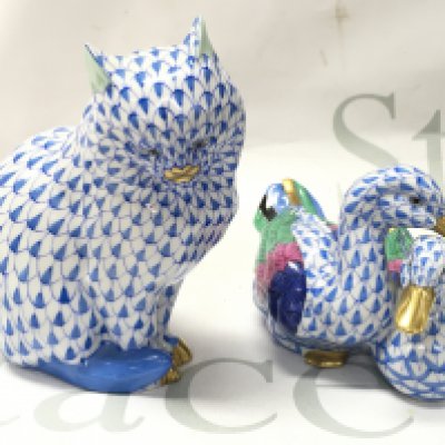 Two Herend porcelain figures , a cat and duck figure group. This lot cannot be posted