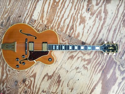 A 2002 Gibson L5-CES Custom electric guitar. Outstanding condition. Comes with original Gibson branded hard carry case.