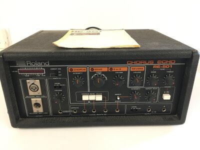 A Roland Chorus Echo RE-501 vintage echo, chorus and reverb unit with manual.