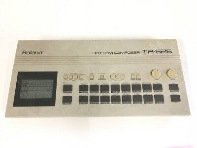 A vintage Roland TR-626 rhythm composer drum machine. Comes with manuals.