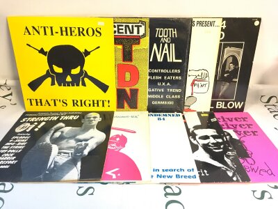 Ten punk /Oi LPs and 12" singles by various artists including Anti Heros, Skrewdriver, Cock Sparrer and others.
