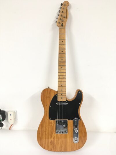A Harley Benton telecaster electric guitar. Comes with a soft carry case.