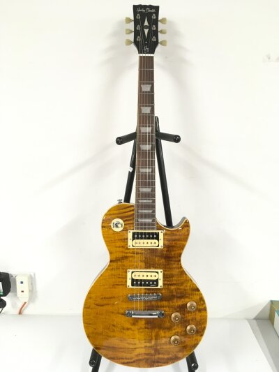 A Harley Benton SC 550L Tribute Les Paul style electric guitar. Comes with soft carry case.