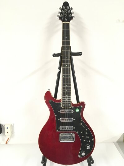 A Harley Benton BM70 DLX electric guitar . Comes with soft carry case.