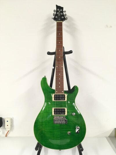 A Harley Benton CST24 Deluxe electric guitar. Comes with soft carry case.