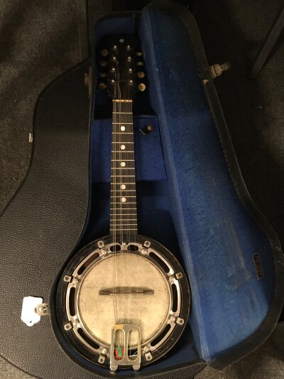 A vintage Barnes & Mullins eight string banjolele with original carry case.