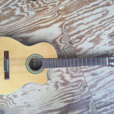An Aria AK30-CE electro acoustic guitar. No case.