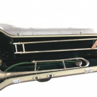 A cased Skylark trombone.
