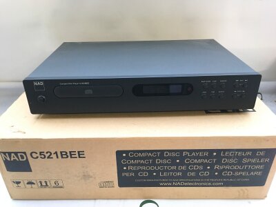 A boxed NAD C521 BEE CD player.