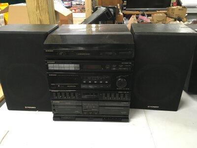 A boxed Pioneer stacking HiFi system comprising a PL-Z81 record player, RX271L receiver etc plus a pair of boxed Pioneer speakers.