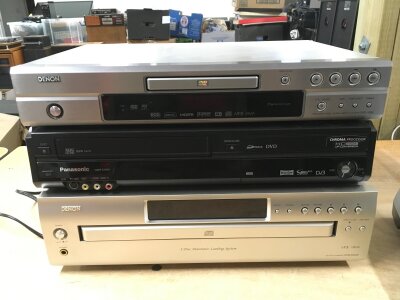A boxed Panasonic video to DVD HD converter, a boxed Denon DVD 1930 player with remote control and power lead plus a boxed Denon DCM 500AE 5 disc CD player with remote control, manual and power lead (3).