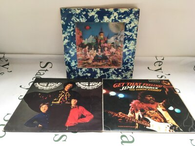 A first UK pressing of the Jimi Hendrix LP Are You Experienced, VG+ and a Get That Feeling LP with Curtis Knight plus a first UK pressing of The Rolling Stones LP Their Satanic Majesties Request, feelable scratch and water damage to sleeve (3).