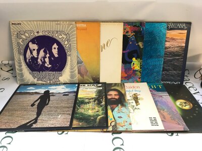 Twelve rock LPs by various artists including Blue Cheer, Santana, Patrick Moraz and others.