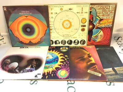 Sixteen jazz LPs by various artists including Miles Davis, Sun Ra, Dr John and others.