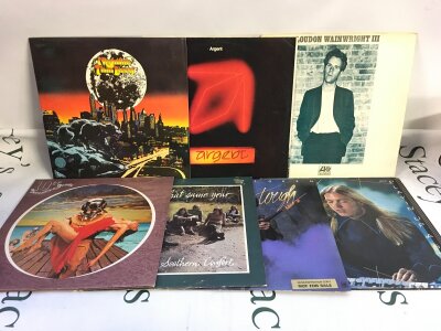 Fifteen LPs by various artists including Thin Lizzy, Argent, Matthew's Southern Comfort and others.