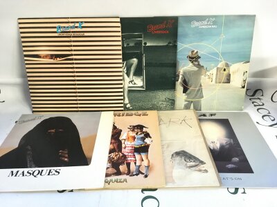 Fourteen LPs by various artists including Brand X, Fleetwood Mac, Mike Rutherford and others.