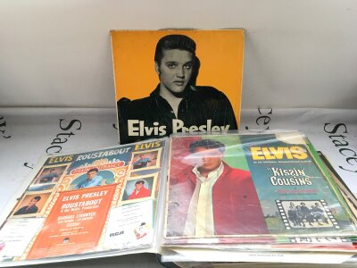 A box and a binder of Elvis Presley LPs comprising both early UK pressings and later reissues.