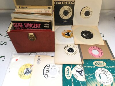 A record case  of rock and pop promo discs and a collection of EPs comprising many rock n roll artists.