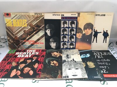 Ten Beatles LPs comprising reissues on black and silver Parlophone labels and some compilations.