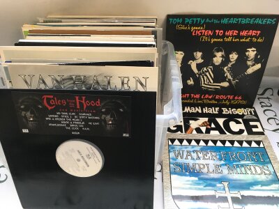 A collection of 12" singles by various artists including a Wu Tang Clan promo disc, Tom Petty, Van Halen, Simple Minds and many more.