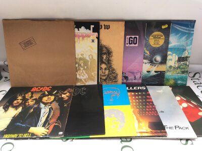 Ten rock LPs by various artists including Led Zeppelin, AC/DC, Queen and others.