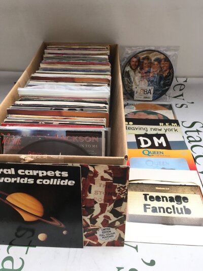 A box of over 180 7" singles comprising mostly 1980s and 90s artists including limited editions and picture discs.