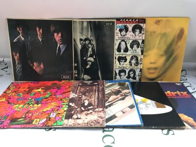 Nine rock LPs by The Rolling Stones, The Who, Cream and others.