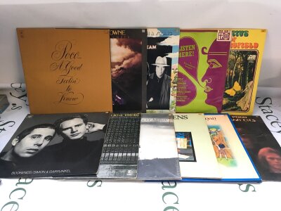 Two bags containing 22 folk / country rock LPs by various artists including Neil Young, Cat Stevens, Poco and others.