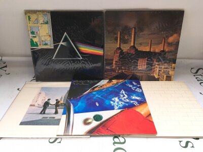 Five Pink Floyd and related LPs comprising Dark Side Of The Moon, Animals and others.