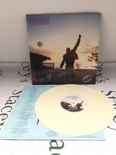 A limited edition ivory coloured vinyl pressing of the Made In Heaven LP by Queen with misprint and all inserts.