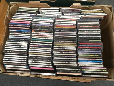 Three boxes of country music CDs.