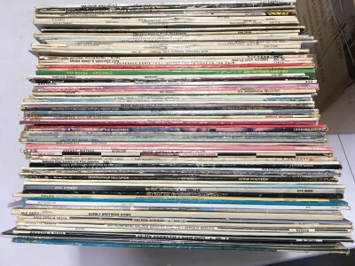 Three boxes of LPs by various artists including Otis Redding, Jimmy Smith, Paul Revere and The Raiders and others.