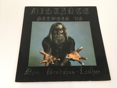 An original UK private pressing of the Distance Between Us double LP by Don Bradshaw - Leather on Distance Records Dist 001. Vinyl EX.