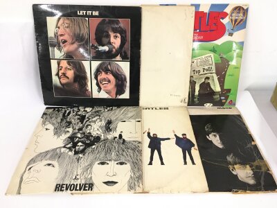 Six Beatles LPs comprising early pressings of Revolver, Help!, a top loading and numbered 'White Album' (only disc 1 and no inserts) and others. Some condition issues.