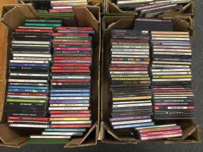 A collection of CDs and audio cassettes by various artists including Elvis Presley, Adam & The Ants, Rolling Stones and many more.