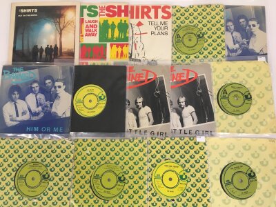 A collection of punk records including some demo discs by various artists including The Shirts, The Banned and others.