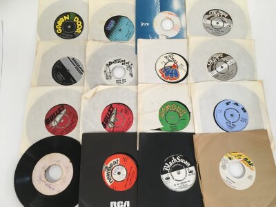 A collection of over 60 reggae and ska 7" singles including Jamaican pressings. Artists include  Peter Tosh,  The Cimmarons, Laurel Aitken, John Holt and many more.