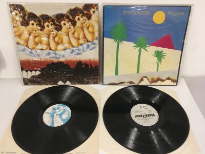 Two first UK pressings of LPs by The Cure comprising Boys Don't Cry on Fiction Records SPELP 26 and Japanese Whispers on Fiction Records FIXM8.