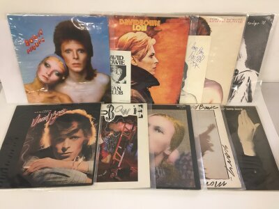 Two bags containing eighteen David Bowie LPs including Diamond Dogs, Low, Hunky Dory and others.