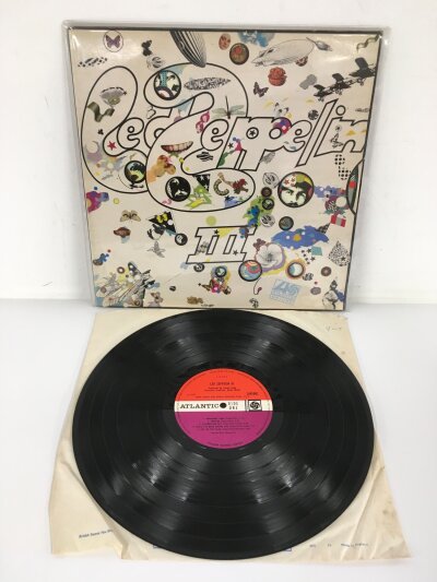 A first UK pressing of Led Zeppelin III with Peter Grant credit and A-5 B-5 matrices. Vinyl EX.