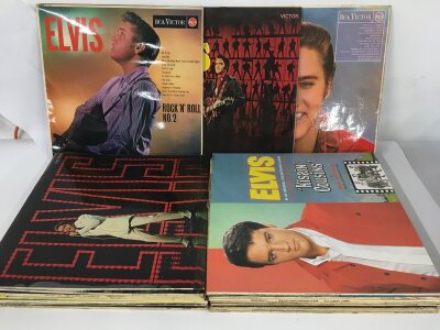 A collection of Elvis Presley LPs comprising a reissue of Rock n Roll No.2, Kissin Cousins, TV Special and others.