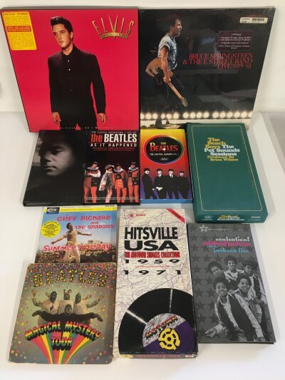 A collection CD box sets including a sealed Bruce Springsteen & The E Street Band - Live 1975/85, The Beatles Capitol Albums Volume 1 and others plus a Magical Mystery Tour vinyl EP.