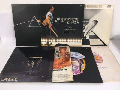 Seven rock LPs comprising a Bruce Springsteen 5LP Live 75/85 box set, an early UK pressing of Time And A Word by Yes, The Who Sell Out and others.