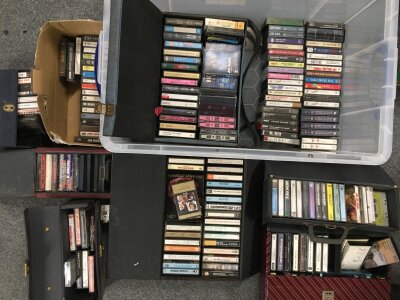 A collection of audio cassettes by various artists including The Beatles, Pink Floyd, Nirvana and many more.