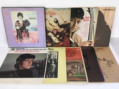 Nine folk rock LPs by various artists including Bob Dylan, Donovan and others.
